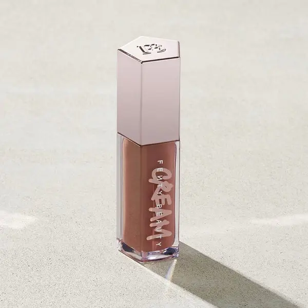 لیپ گلاس فنتی بیوتی Gloss Bomb Cream مدل Fenty Glow 02 لیپ گلاس فنتی بیوتی Gloss Bomb Cream مدل Fenty Glow 02